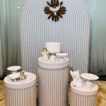 Leia mais sobre o artigo Batizado Painel Oval Branco Ripado E Cilindros Branco Ripado Album I